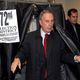 Photo of a man leaving a Shoup Lever Machine booth. Via AP.
